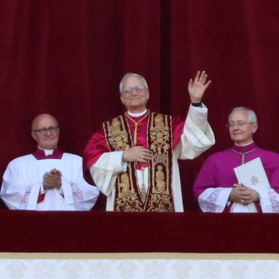 Pople Leo XIV waves from balcony on May 8, 2025