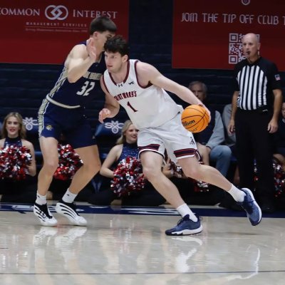 Men's basketball player Harry Wessels drives against UC Merced in November 2025