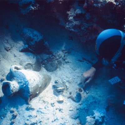 Diver near ancient pottery at Uluburun dive site