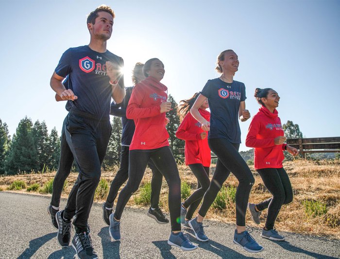 Students run on a sunny day