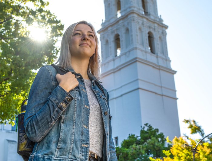 Proud student looks into the distance