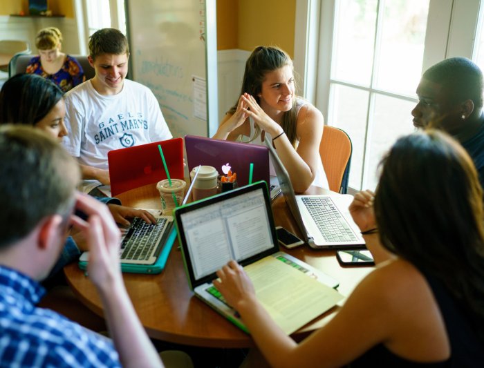 Students sitting at round table studying