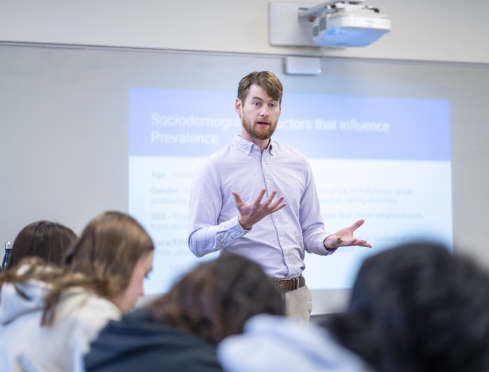 A professor is giving a lecture