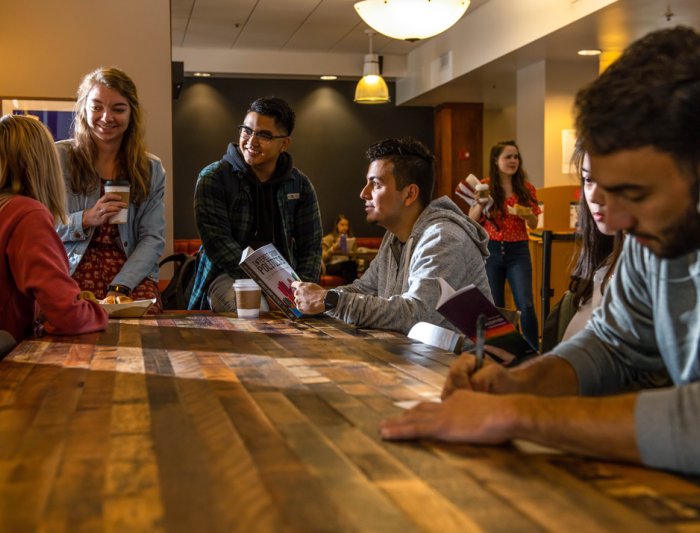 Students in a cafe on Saint Mary's College Campus talking