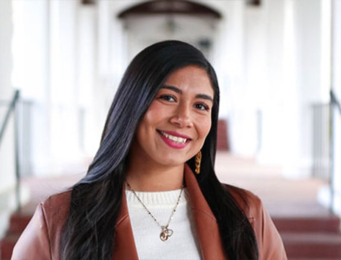 faculty in front of building