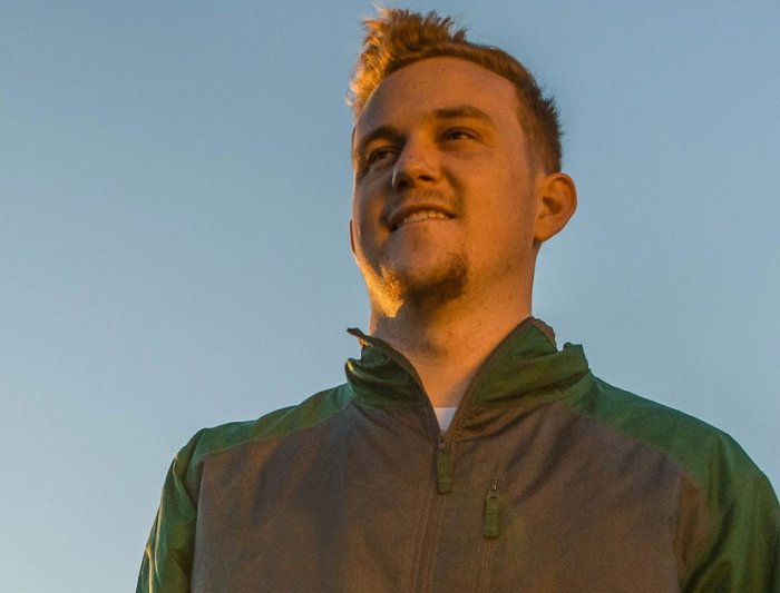 business student in front of saint mary's observatory