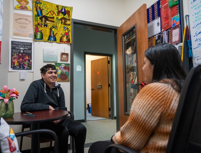 Success Coach and student having a discussion 