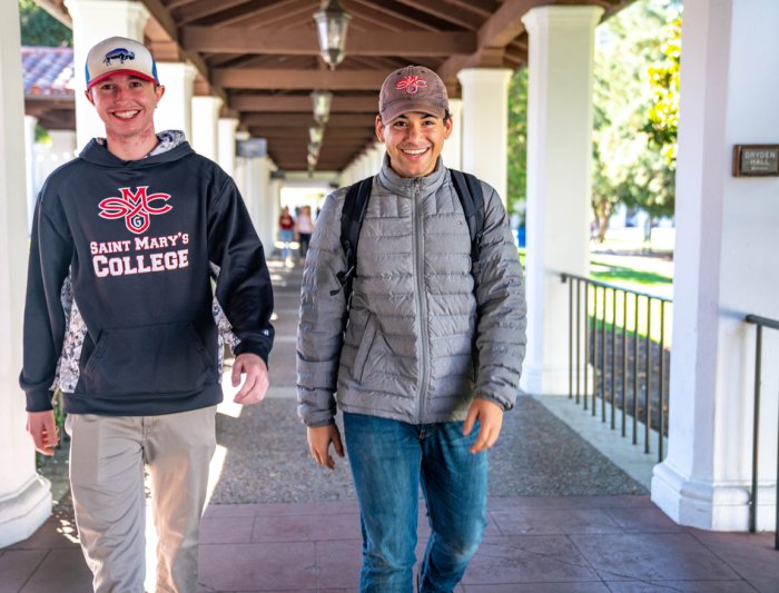 Saint Mary's students walking together smiling