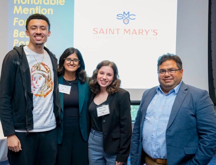 2024 Business Analytics Team in front of screen