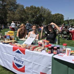 Image of Students at the GaelPantry Booth at a Campus Event