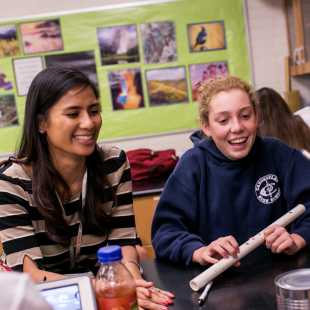 A teacher and student working together