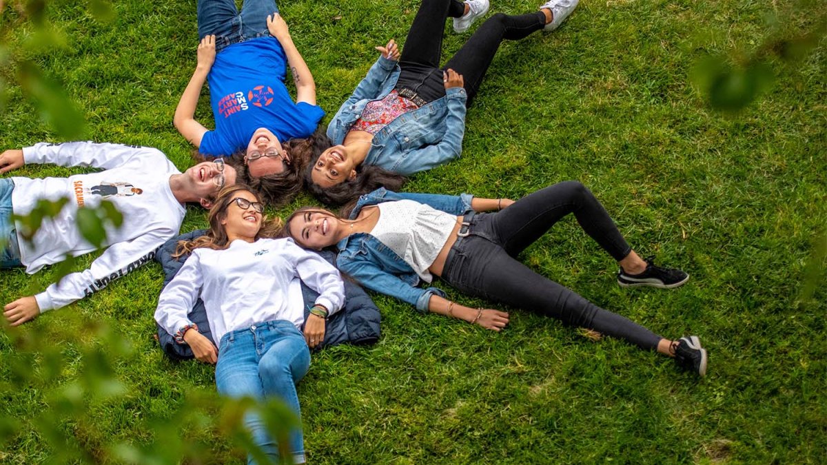 students relax outside