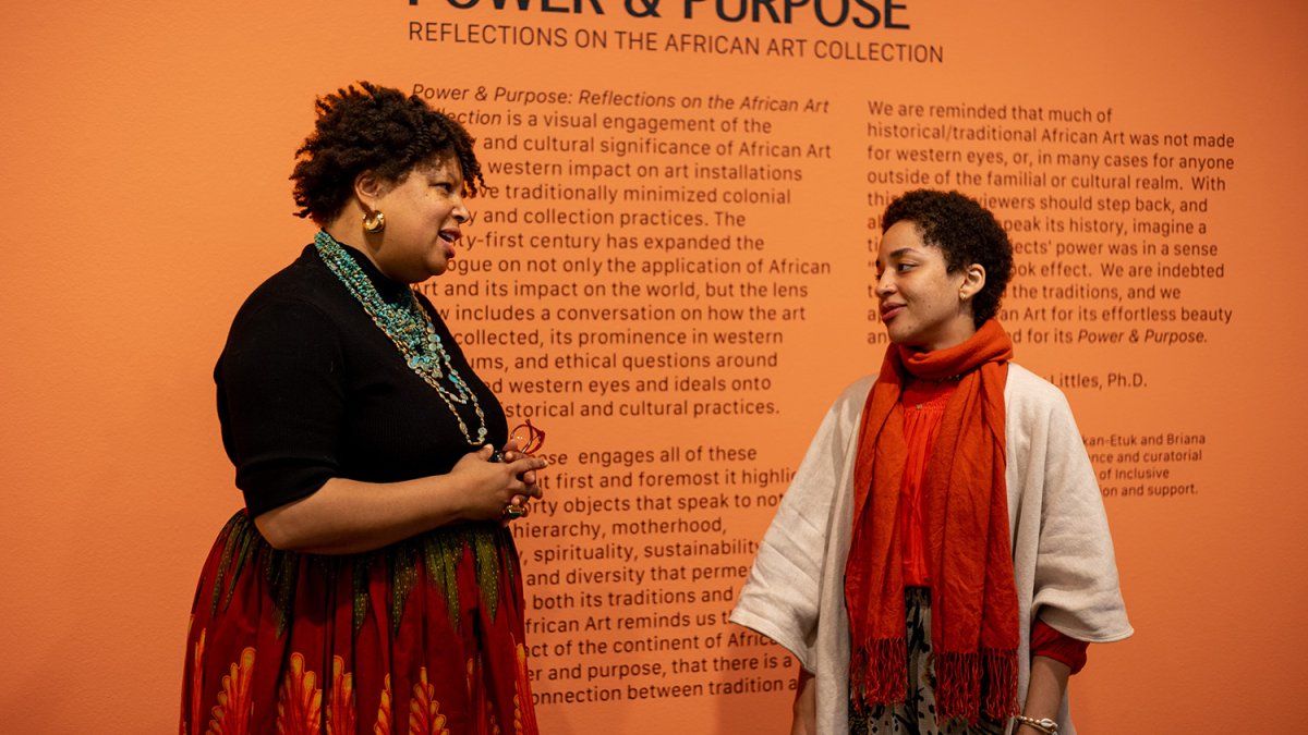 a museum staff and student having a conversation at the Museum of Arts at SMC