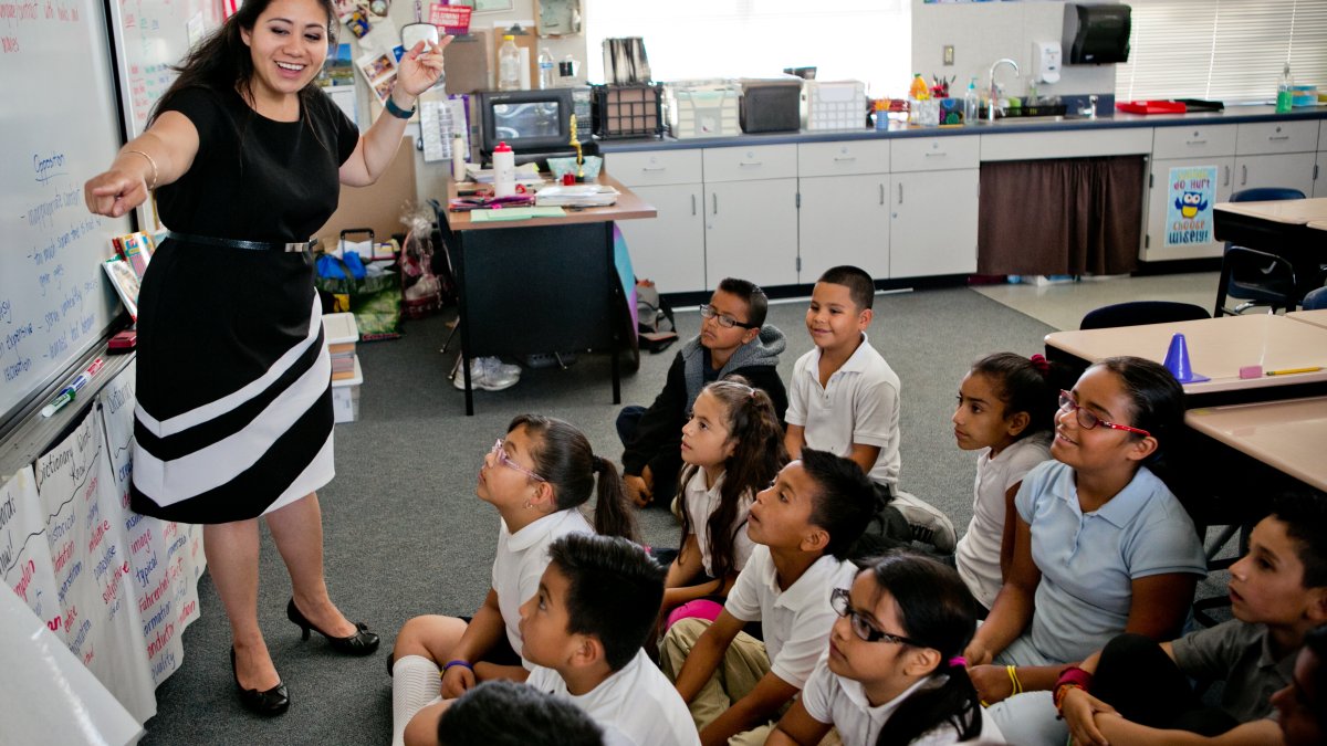 A KSOE graduate teaching her class