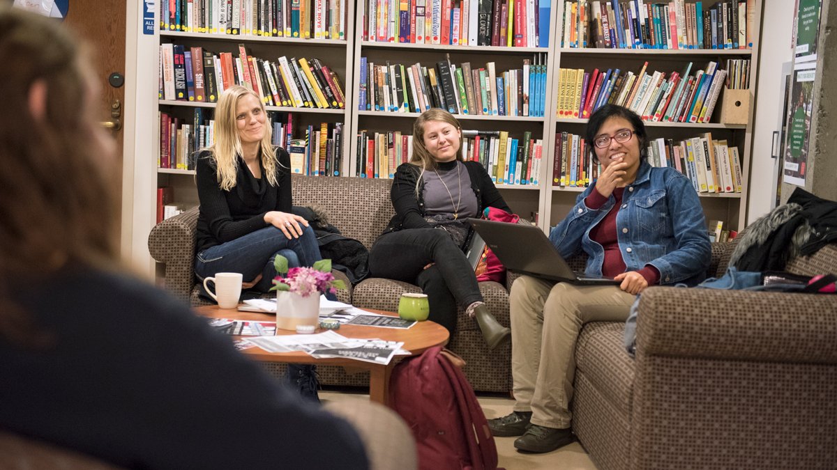 Students sitting in the Center for Women and Gender Equity talking