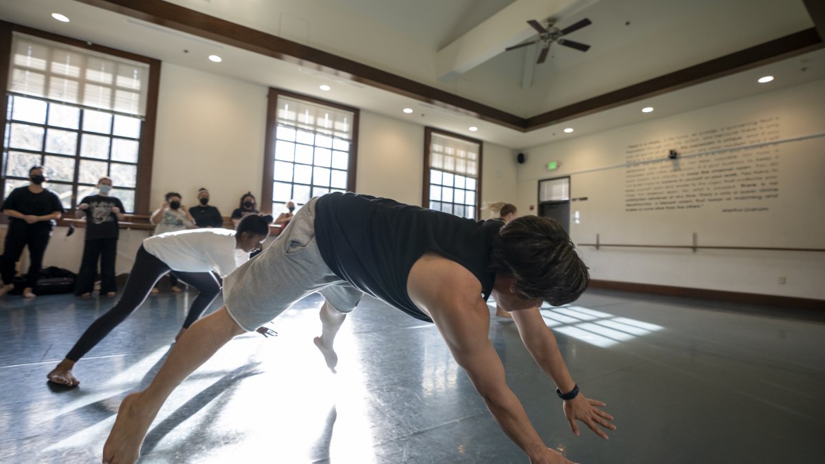 Photo of Rogelio Lopez, Instructor/Program Director midair teaching 