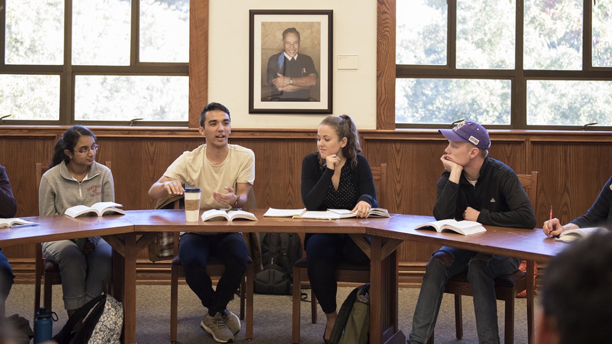 Students discussing a topic in a seminar class
